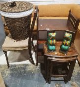 Three-tier shelving unit on castors, a nest of three tables, two frog book ends, a laundry basket