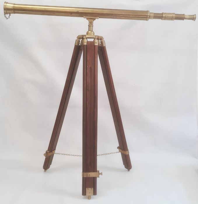 20th century brass telescope on wooden tripod stand, 100cm wide approx. Condition Report Is a