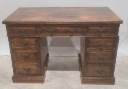 Late 19th/early 20th century oak nine drawer pedestal desk on plinth base Condition Report