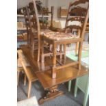 Oak extending table and four chairs (5)