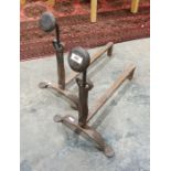 Pair of wrought iron andirons, 47cm high (2)