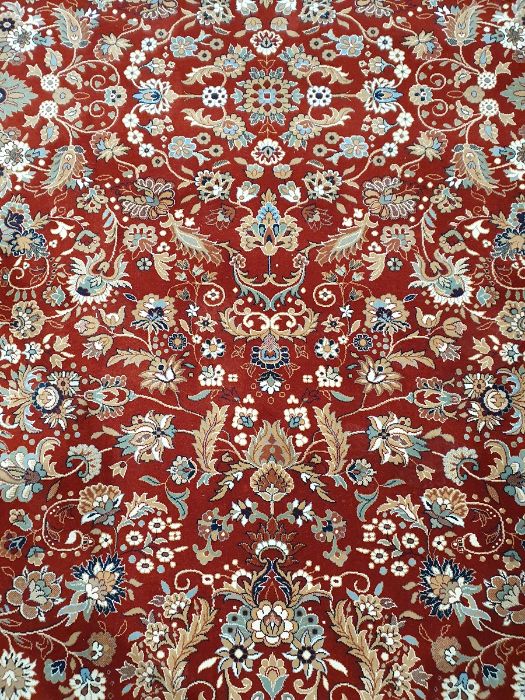 Modern red ground rug with allover foliate decoration, cream ground foliate decorated border, - Image 3 of 4