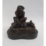 Bronze model of a monkey seated on a branch, marked 'Barie', on a black marble base, 11cm high