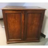 Late 19th/early 20th century two door cupboard, the rectangular top with moulded edge, the front