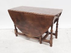 20th century oak gateleg oval top table on turned and block supports, stretchered  base, 122cm x