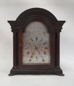 Mantel alarm clock the moulded arch top above single glazed door enclosing steel face marked 'JN