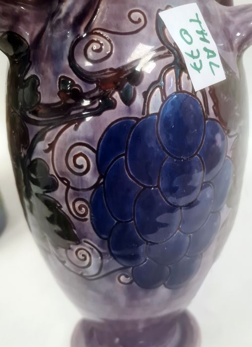 Torquay pottery vase decorated with a bird perched on fruiting branches, 32cm high (large chip to - Image 7 of 13