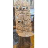 20th century African style two plank chair carved with various African animals