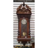 Walnut Vienna regulator Roman numerals to the enamel dial, 115cm tall