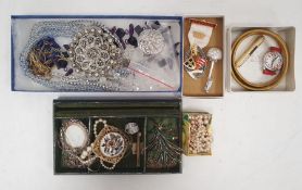 A small quantity of costume jewellery, beaded necklaces, simulated pearls, brooches, a Masonic