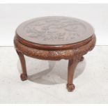 20th century Chinese hardwood circular table, carved decoration, 80cm diameter approx.