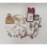 A quantity of silver and costume jewellery to include a silver ring, a silver ingot pendant,