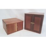 Two coin collector's cabinets each with a pair of doors enclosing assorted coin drawers (2)