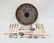 Circular tray and assorted flatware