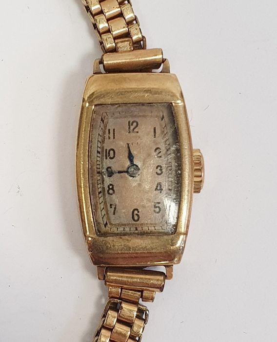 Lady's 1920's/30's 9ct gold Rolex wristwatch with convex sided oblong dial and the rolled gold