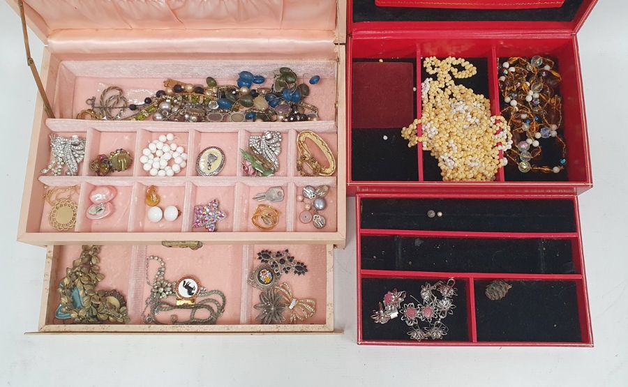 Two jewellery boxes of costume jewellery, brooches, beaded necklaces, clip-on earrings etc (2 boxes)