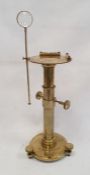 De Grave Short & Co Ltd makers, London, adjustable brass stand fitted with spirit levels, 33cm high