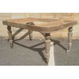 In the manner of Gillows of Lancaster table frame with four Gillows type turned legs, brass caps and