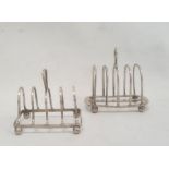 Two 20th century silver toast racks, on bun feet, 4ozt approx.