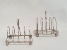 Two 20th century silver toast racks, on bun feet, 4ozt approx.