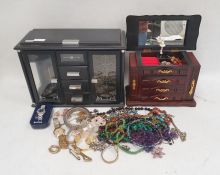 A large quantity of costume jewellery to include earrings, necklaces, bangles, beaded necklaces,