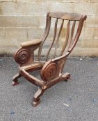 Mahogany chair frame with a roundel decoration to arms