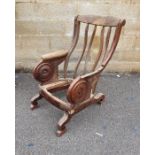 Mahogany chair frame with a roundel decoration to arms