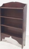 20th century oak open bookcase of four shelves with egg and dart moulded decoration, 63cm x 105cm