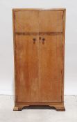 Two Art Deco two door-wardrobes in bird's eye maple, walnut inlay, ogee bracket feet (2)