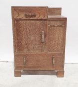 Early 20th century Art Deco style oak bedroom unit with single drawer above cupboard door above long