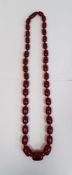 Red amber bead necklace, graduated and nine loose beads, gross weight approx. 110gCondition Report