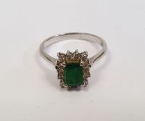 14ct white gold emerald and diamond cluster ring, the baguette-cut emerald 4mm in diameter