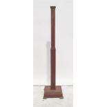 Walnut standard lamp, chamfered column on square base