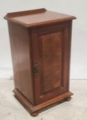 Early 20th century walnut pot cupboard,the square top with moulded edge, single cupboard door