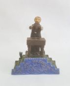 Circa 1900 cast iron money bank, painted 'Magician Bank', with magician standing at table with