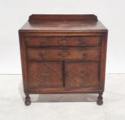 20th century oak cabinet, two drawers above two cupboard doors, turned supports, 90cm x 91cm