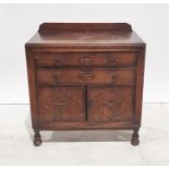 20th century oak cabinet, two drawers above two cupboard doors, turned supports, 90cm x 91cm