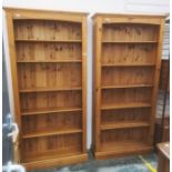 Pair of pine bookcases, plinth bases (2)Condition Report Approx. Dimensions: H198cm x W96cm x D29.