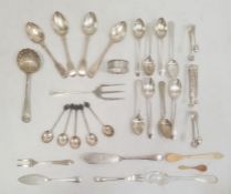 Assorted silver and plated spoons, coffee spoons, teaspoons, sugar nips and a silver napkin ring (