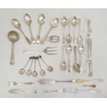 Assorted silver and plated spoons, coffee spoons, teaspoons, sugar nips and a silver napkin ring (