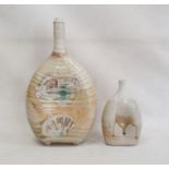 Two studio pottery vases decorated with sea shells on pale green ground (2)