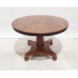 19th century mahogany circular dining table on faceted column to quatrefoil base, turned feet, 140cm