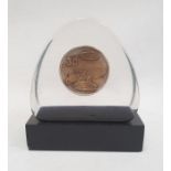Ford 30 commemorative medal in a perspex case, on rectangular stand, 16cm high