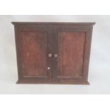 Oak jewel cabinet with two doors enclosing shelves and contents of assorted nuts, bolts, drill bits,