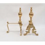 Pair of brass firedogs with knopped stems and lion's mask decoration, on scrolling feet, 31cm