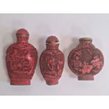 Chinese carved cinnabar lacquer snuff bottle, slender ovoid with panels of flowers, 6.5cm high,