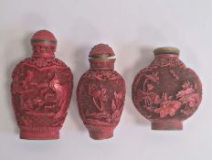 Chinese carved cinnabar lacquer snuff bottle, slender ovoid with panels of flowers, 6.5cm high,