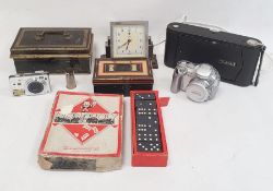 Kodak camera, vintage cash tins, a Tenko electric clock in bakelite case, games, etc