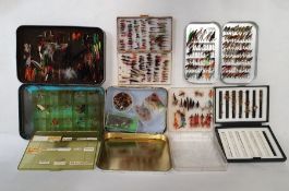 Quantity of fishing accessories including flies, reels and line, in a canvas bag and a number of