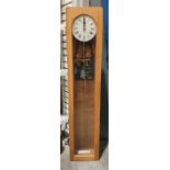 TR service oak cased wall clock with Roman numerals, 127cm high